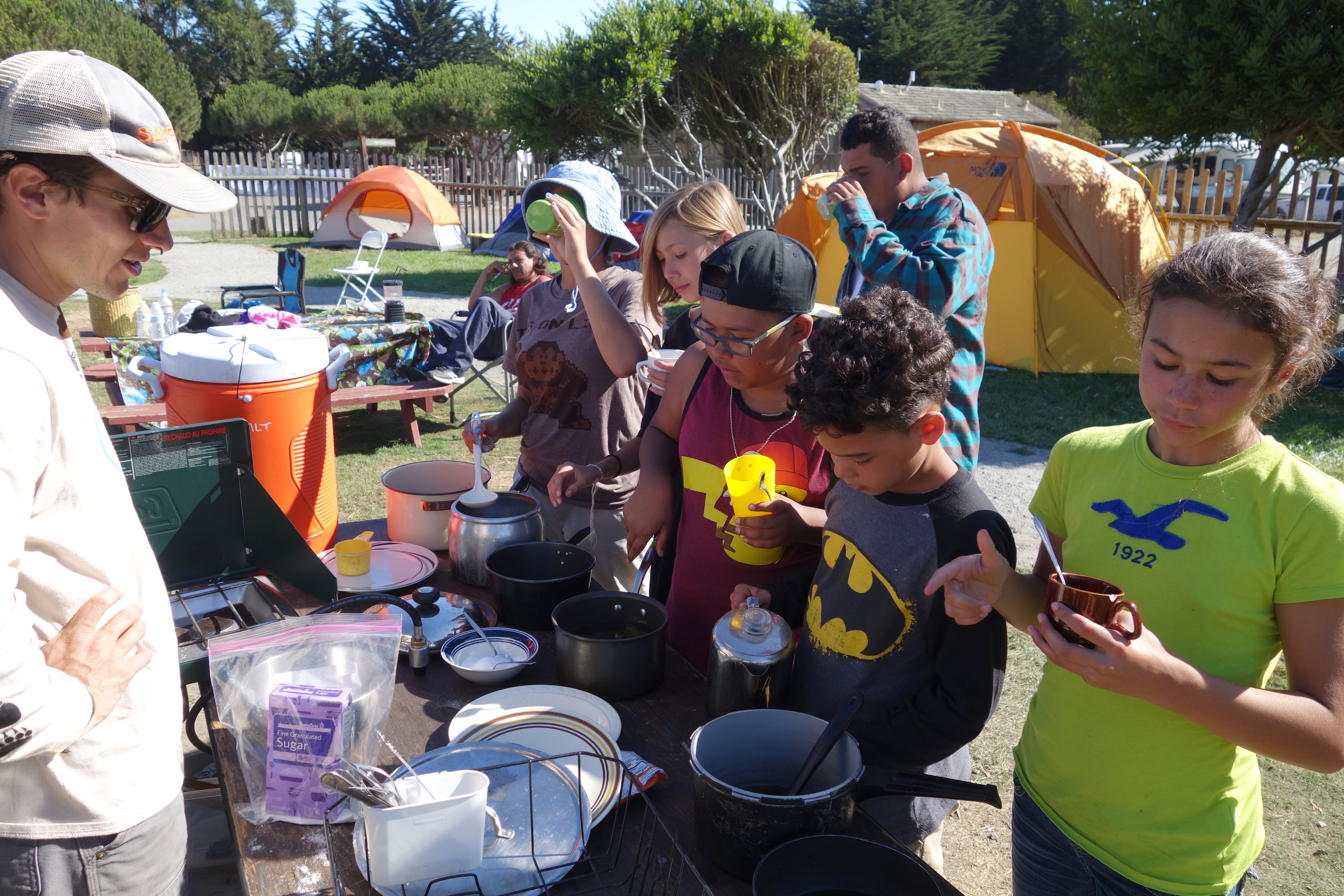 Campers sample teas made from native medicine plants they helped gather. Photo courtesy Cat Wilder.